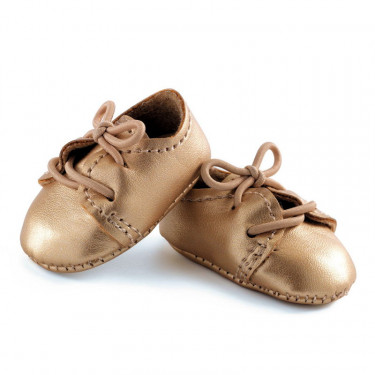 Chaussures dorées pour poupée POMEA de Djeco 7887