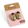 Chaussures dorées pour poupée POMEA de Djeco 7887