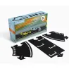 Circuit Grand Prix Waytoplay, coffret 24 pcs: pièces noires en forme de route à assembler autour d’un coffret coloré.