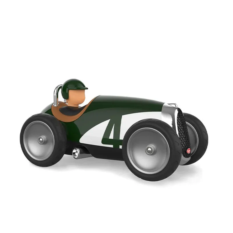 Voiture de course Baghera verte et blanche N°4 avec pilote miniature et design rétro, silhouette orange-brun assise, roues argentées.