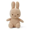 Peluche Miffy en velours côtelé beige de 23 cm, lapin assis à oreilles longues, détail noir simple sur le visage.
