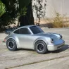 Voiture-jouet Porsche 911 argentée de marque Baghera, miniature Racing Car, vue de profil sur plancher bois en extérieur.