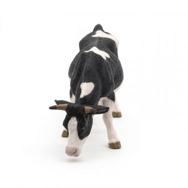 Vache noire et blanche broutant, PAPO 51150