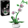Orchidée CADA 237 pièces : set de construction florale anti-stress avec plante verte et fleurs orchidées blanches et roses, boîte noire au logo CaDA.