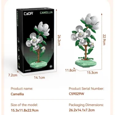 Box et visuel du set Camellia CADA 301 pièces montrant une fleur artificielle montée sur socle vert, dimensions packaging  26.2x14.1x7.2 cm et modèle 15.3x11.8x22.9 cm.