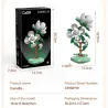 Box et visuel du set Camellia CADA 301 pièces montrant une fleur artificielle montée sur socle vert, dimensions packaging  26.2x14.1x7.2 cm et modèle 15.3x11.8x22.9 cm.