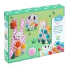 Set de points et pompons DJECO 0965 pour créer des animaux en herbe colorés avec des pompons fluo, boîte illustrée.