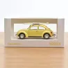 Miniature VW Coccinelle 1303 jaune pastel (1973) avec planches de surf sur le toit, dans emballage blanc NOREV 1/43.