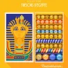 Grand coffret de billes "Toutankhamon" Billes & Co avec visage égyptien doré sur le couvercle et rangées de billes colorées dans le tiroir intérieur.