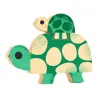 Puzzle en bois Djeco 1084 Puzz and Play Family: tortue avec motifs verts et beige, pièces assemblées en relief.