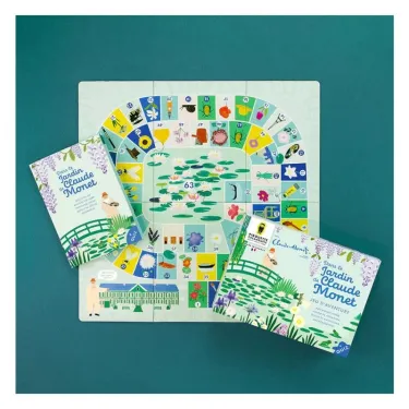 Jeu de l’oie coloré intitulé Dans le jardin de Claude Monet, avec le plateau de jeu rond, cartes et livret illustré sur fond vert.