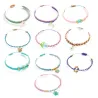 Bracelets en macramé bleus DJECO 0036, ensemble coloré de bracelets à nœuds macramé avec perles et charms variés.