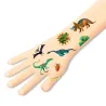 Tatouages Dino Club Djeco 9598: motifs colorés de dinosaures et créatures préhistoriques sur le bras, style stickers temporaires