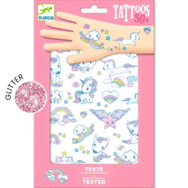 Tatouages Licornes DJECO 9575, emballage rose avec motif de main affichant des tattoos arc-en-ciel et licornes sur papier blanc, inclus glitter rose.