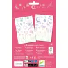 Tatouages « Lucky charms » DJECO 9596 : planche de tatouages tempérés holographiques multicolores sur fond rose, avec motifs animaux et symboles fantaisistes.