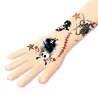 Tatouage temporaire Pirate DJECO 9584 sur une main, avec crâne et voile, navire, sabre et motifs pirates le long du bras.