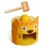 Mini tambour et marteau en jeu de tap-tap DJECO 6490 SoftiTap, avec balle et marteau en forme de château jaune.