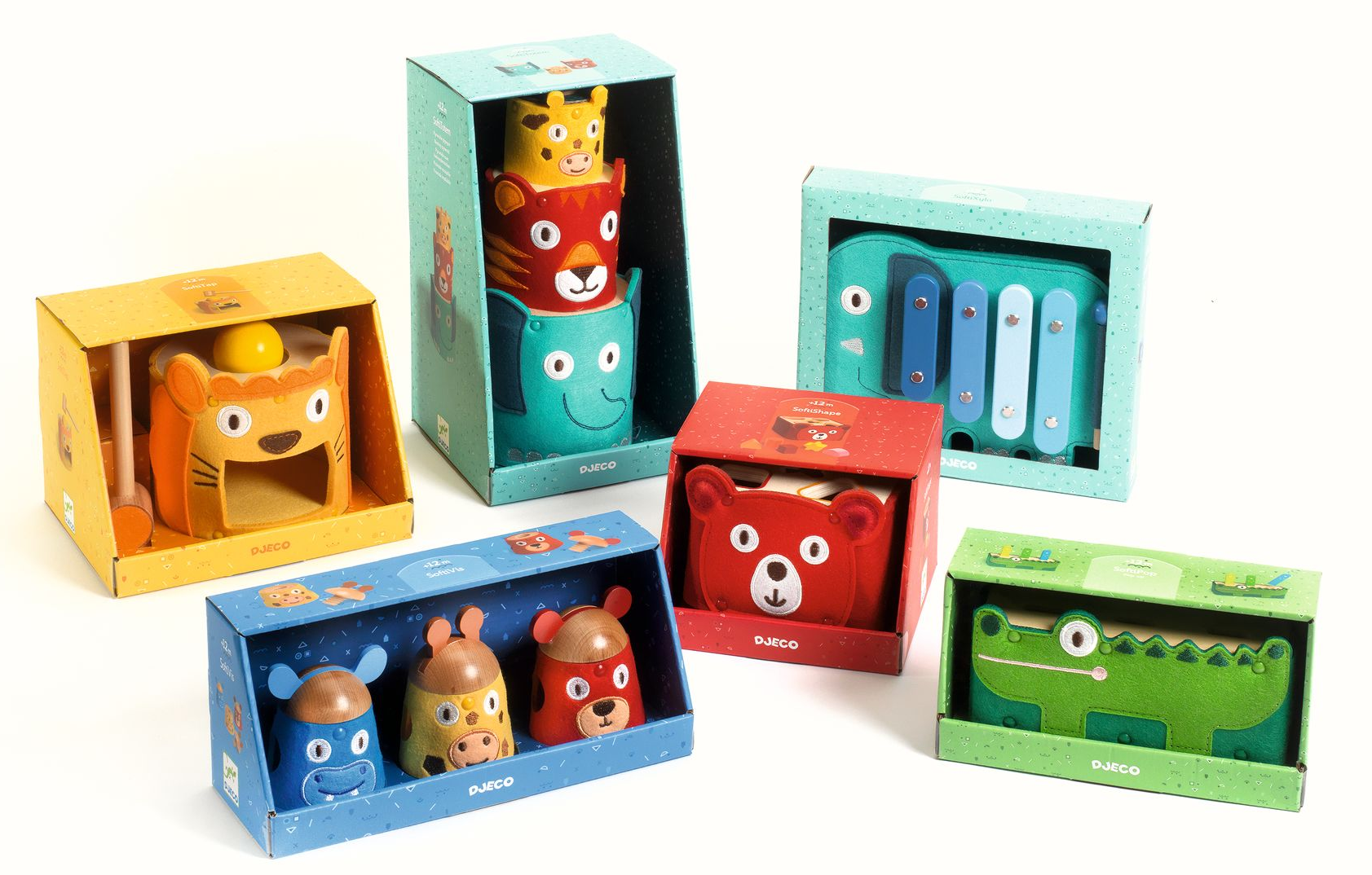 Boîtes-cadeaux DJECO avec peluches et jouets colorés en forme d’animaux (ours, crocodile, tigre, singe) et ensembles en bois, emballage pastel. Boîtes-cadeaux DJECO avec peluches et jouets colorés en forme d’animaux (ours, crocodile, tigre, singe) et ensembles en bois, emballage pastel.